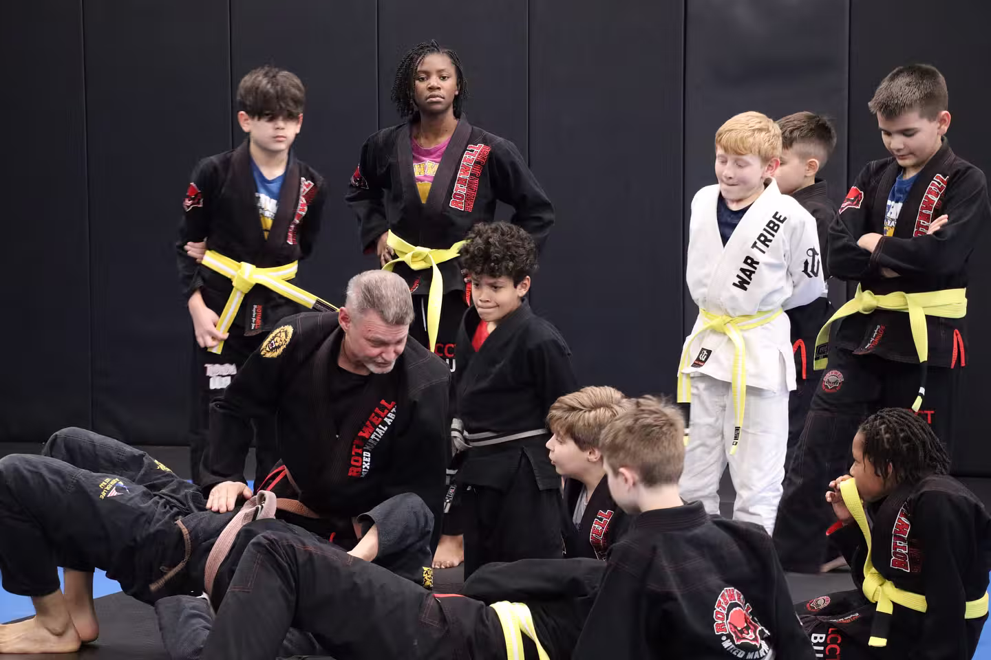An instructor teaching children the bushido code