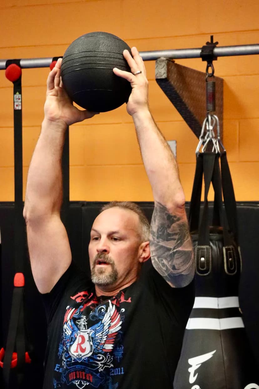 A man training with a medicine ball