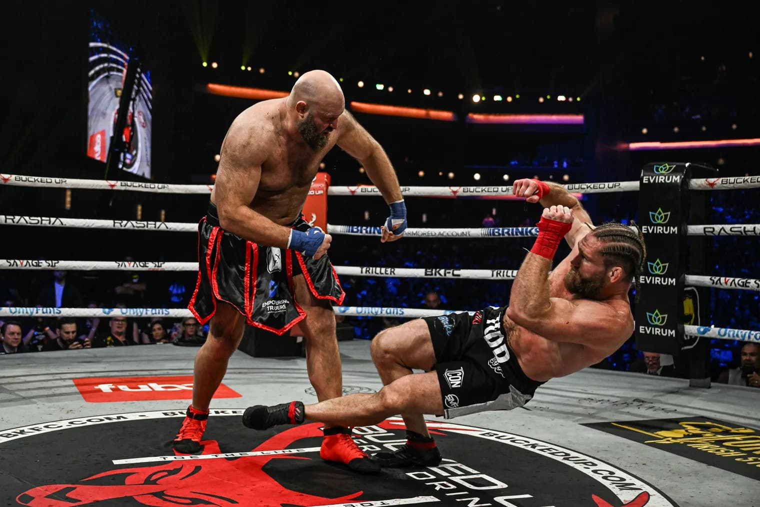 Ben Rothwell knocking down an opponent in an MMA fight