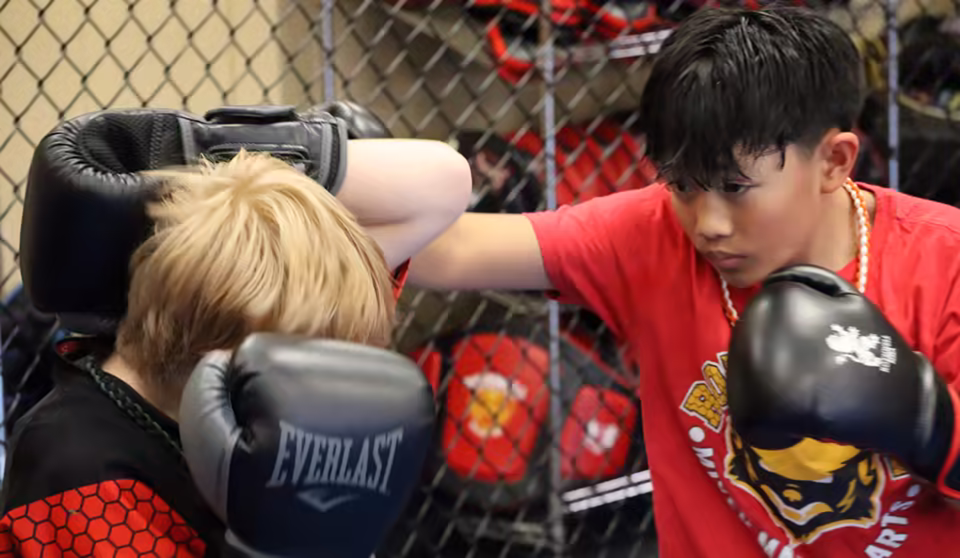 kids sparring in kickboxing class