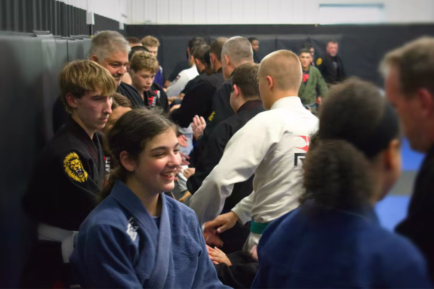 Students shaking hands after a class